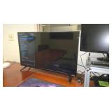 VIZIO Smart TV, Acer monitor, Dell mini computer, keyboard and mouse