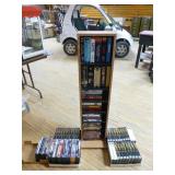 Collection of DVDs and VHS Tapes with Tower Cabinet
