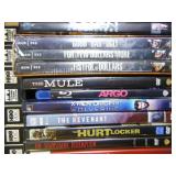 Collection of DVDs and VHS Tapes with Tower Cabinet