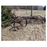 Hay Rake - Vintage Wheel-Driven Frame, Rusted Iron Farm Implement