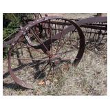 Hay Rake - Vintage Wheel-Driven Frame, Rusted Iron Farm Implement