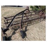Hay Rake - Vintage Wheel-Driven Frame, Rusted Iron Farm Implement