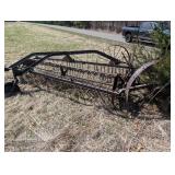 Hay Rake - Vintage Wheel-Driven Frame, Rusted Iron Farm Implement