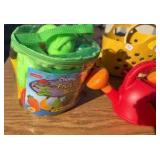 lot of musical, fruit and watering cans