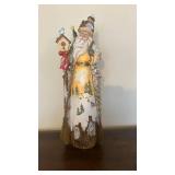 Vintage Santa Claus Figure with Winter Village Scene on Snowy Tree-Trunk Base