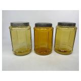 Three Antique Amber Glass Tobacco Jars