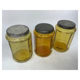 Three Antique Amber Glass Tobacco Jars