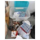 Clear Plastic Storage Tote with Assorted Linens, Towels & Decorative Home Decor