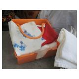 Clear Plastic Storage Tote with Assorted Linens, Towels & Decorative Home Decor
