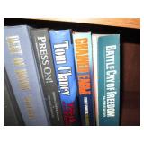 Assortment of large Tom Clancy book...