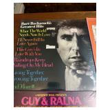 Unopened -collection of vintage vinyl records featuring artists like Burt Bacharach, Lawrence Welk, and Bert Kaempfert.
