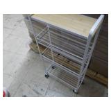 4 Shelf Unit On Wheels 31 x 15 x 6"...