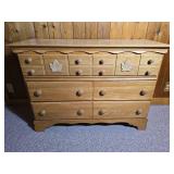 Solid Wood Dresser with Multiple Drawers and Leaf Carved Accents