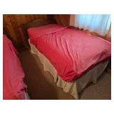 Pair of Twin Beds with Linens and Bed Skirts