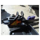 Poulan chainsaw in case. Looks lightly used. As shown.