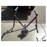 Pair of adjustable roller stands. As shown.