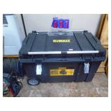 Dewalt rolling storage box. 39 x 23 x 24 with contents. As shown.