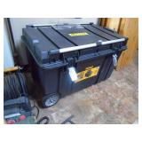 Dewalt rolling storage box. 39 x 23 x 24 with contents. As shown.