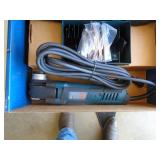 New in box Bosch oscillating tool with accessories. As shown.