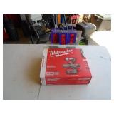 New in box Milwaukee M18 1/4 impact with battery & charger. As shown.