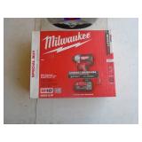New in box Milwaukee M18 1/4 impact with battery & charger. As shown.