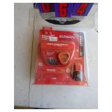 New in box Milwaukee M12 battery & charger. As shown.