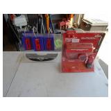 New in box Milwaukee M12 battery & charger. As shown.