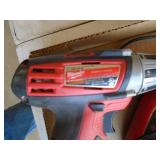 Milwaukee M12 driver with 2 batteries & charger. As shown.