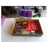 Flat of extractors & drill bits. As shown.