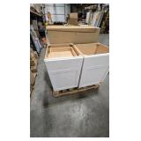 pallet of white cabinets
