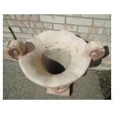 Cement planter measures 28" tall...
