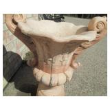 Cement planter measures 28" tall...