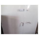 Metal cabinet 87" tall 36" wide...