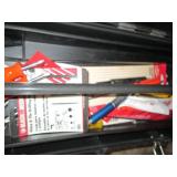 Tool box filled with hand tools and...