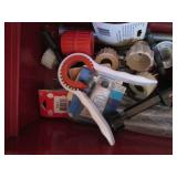 Toolbox filled with plumbing suppli...