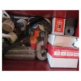 Toolbox filled with plumbing suppli...