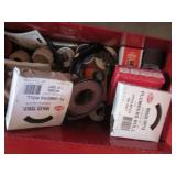 Toolbox filled with plumbing suppli...