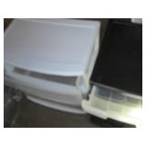 2 Plastic organizers on wheels...