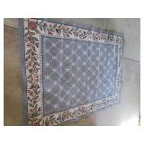 Decorative area rug, measuring 90 x...