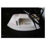 Foot bath and clothing iron...