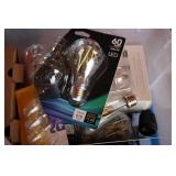 Tote of mixed light bulbs...
