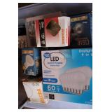 Tote of mixed light bulbs...