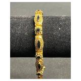 Florenza Gold-Tone Filigree Onyx Bracelet - Oval Black Onyx Accents