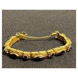 Florenza Gold-Tone Filigree Onyx Bracelet - Oval Black Onyx Accents