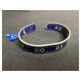 Necklace - Silver Tone Chain with Lot of Cuff Bracelets w Ruler Designs & One w Blue Crystal