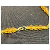 1933 Gold Tone Expo Cuff Bracelet, Black Onyx Beaded Necklace, Amber Glass Beaded Necklace, Gold Tone Bracelet w Safety Chain & More