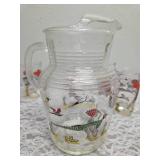 Hazel-Atlas Glass Company Pitcher with 8 Glasses.  These glasses feature the  "Pheasants" pattern, produced roughly 1950