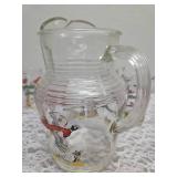 Hazel-Atlas Glass Company Pitcher with 8 Glasses.  These glasses feature the  "Pheasants" pattern, produced roughly 1950