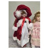Three collectible porcelain dolls.  From the Premier Doll collection.