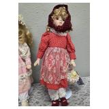 Three collectible porcelain dolls.  From the Premier Doll collection.